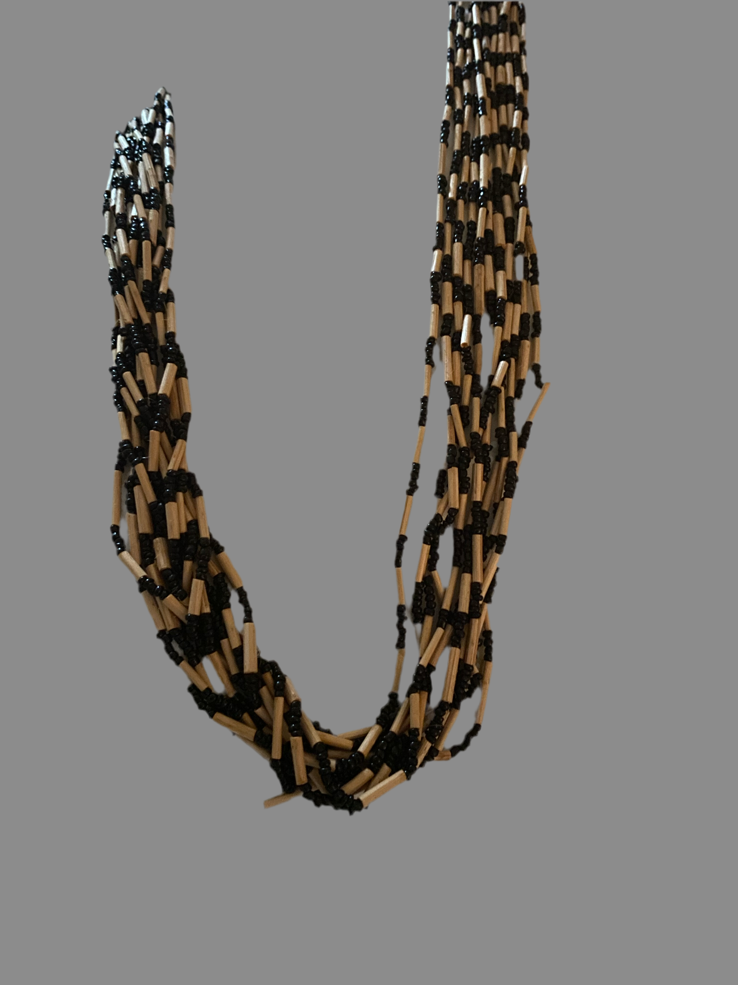 Multiple strands of seed beads and wooden tubes. Vintage