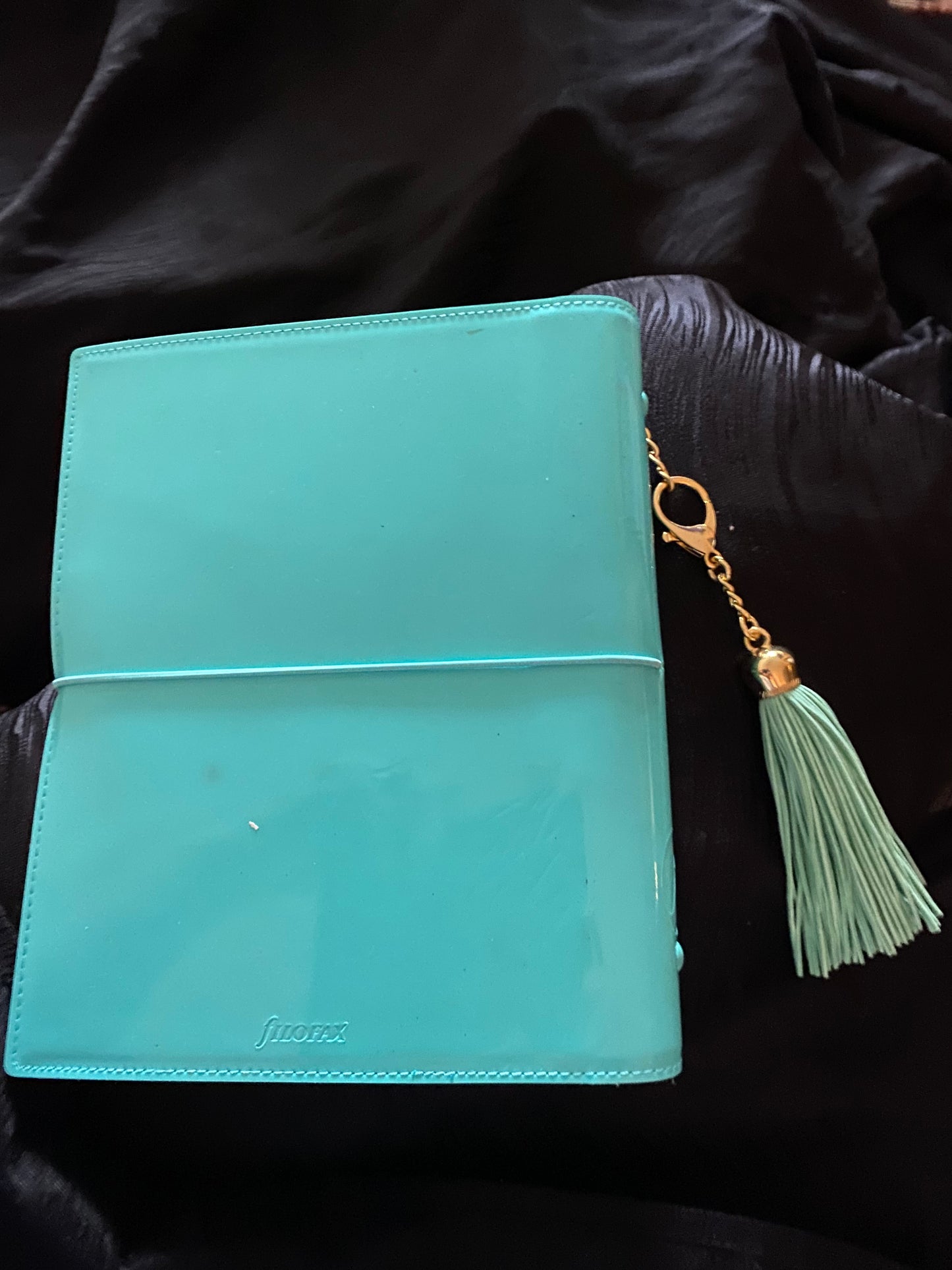 Filofax Turquoise Patent Planner. Rarely Used, Excellent Condition. Many accessories included! (See description for details)