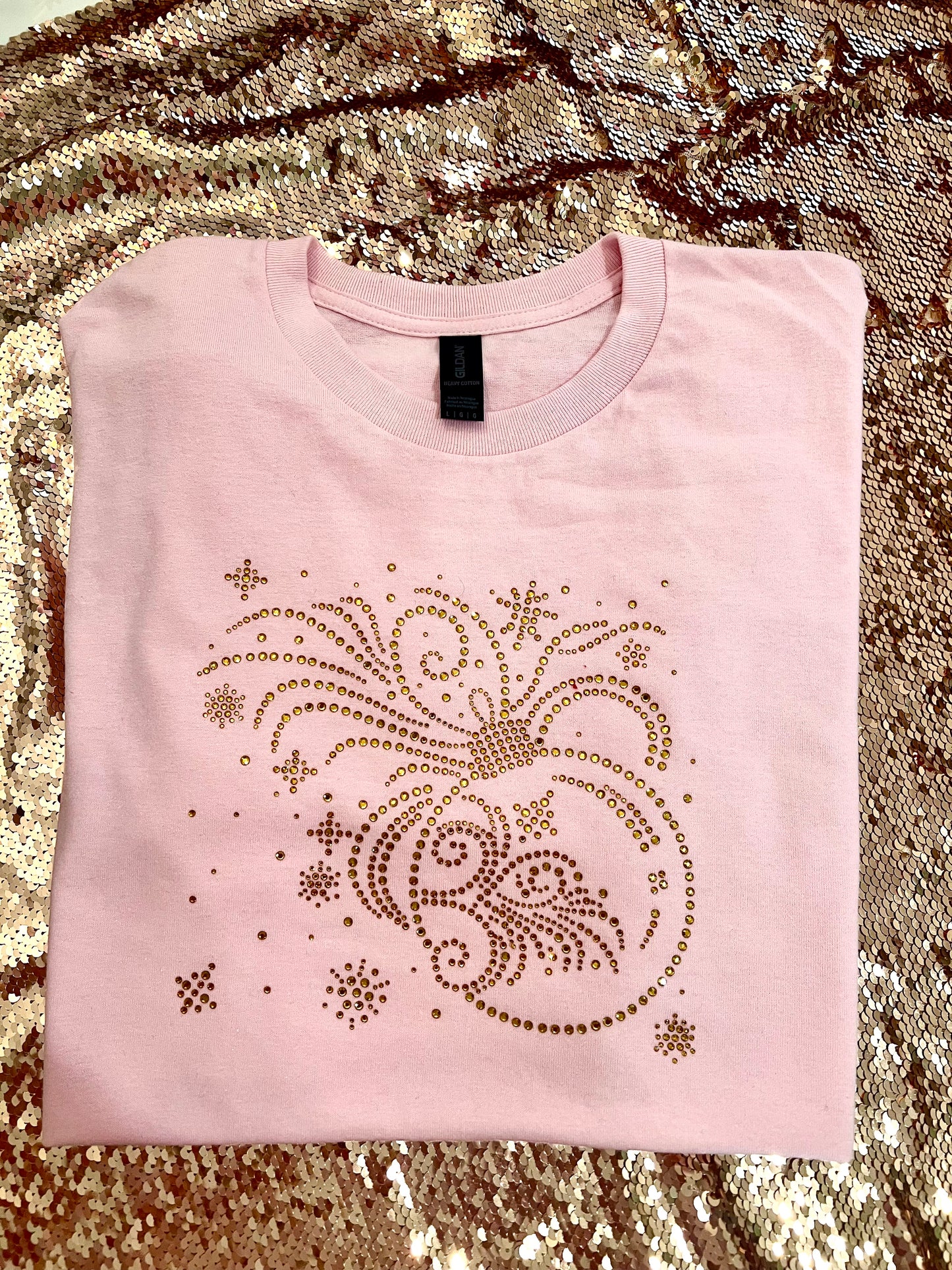 Gold Ornament on Size LG Pink Shirt