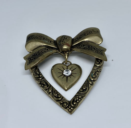 Vintage Heart Dangling Rhinestone Heart Brooch
Antiqued Brass Bow