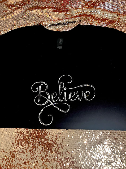 We’re Never Too Old To BELIEVE! Super Sparkling Rhinestone Decal on Size Lg Black Shirt