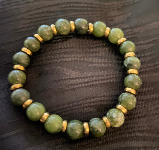 Jade Stone Bracelet W/Gold Tone Spacer Beads.